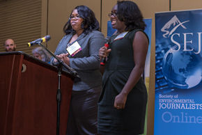 Tiara Darisaw (right) and her mother Lashaya Darisaw at the opening reception in Flint, Mich, 2018.